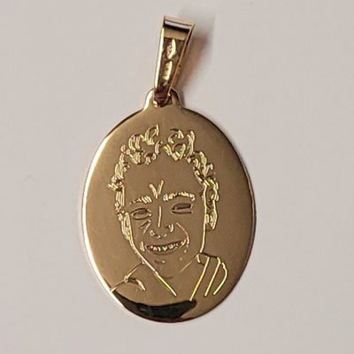 Médaille en or gravée d'un portrait